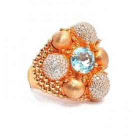 Rose gold ring with aquamarine and zircons